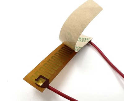 Нагревательная пластина 63х14мм (9V-5W, 12V-10W, 15.2 Ом) LFH-9408pg на клейкой основе