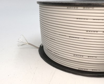 На катушке Медный провод 24AWG 100м 0,2 кв.мм (40*0,08мм) (серый, UL3135) LFW-24Gr в мягкой силиконовой изоляции